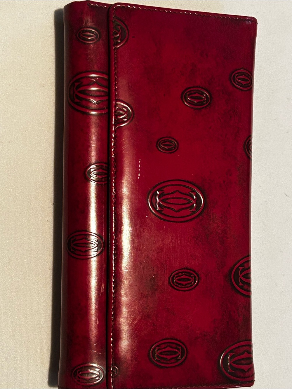 Cartier “Must de Cartier” vintage bordeaux patent leather long wallet